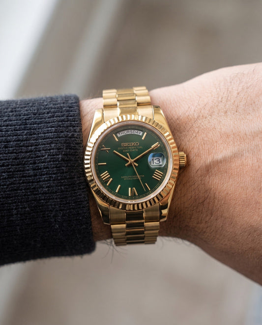 Gold Money Green Day-Date on the wrist